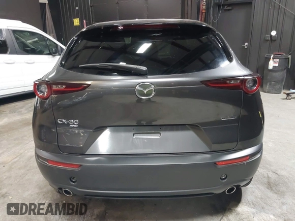 2021 Mazda CX-30 Preferred with VIN 3MVDMBCL1MM247701, listed as a IAAI auction lot 42299009 with 15,880 mi miles and . Bid and sale history available at DreamBid. Image 17.