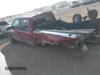 2004 Chevrolet Silverado 2500 LT z VIN 1GCGK23U04F185494, wystawiony jako IAAI lot #40544442 z przebiegiem Nie podano mil oraz . Historia ofert i sprzedaży dostępna na DreamBid. Obrazek 3.