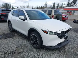 2023 Mazda CX-5 2.5 S Premium Plus Package with VIN JM3KFBEM3P0236481, listed as a IAAI auction lot 41815369 with 34,679 mi miles. Bid and sale history available at carsss.com. Image 1.