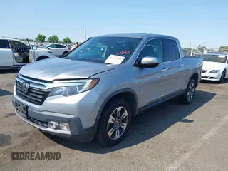 2019 Honda Ridgeline RTL-E with VIN 5FPYK3F79KB029771, listed as a IAAI auction lot 42448369 with 90,142 mi miles and . Bid and sale history available at DreamBid. Image 2.