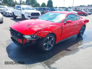 2020 Ford Mustang EcoBoost with VIN 1FA6P8TH4L5157629, listed as a IAAI auction lot 42650450 with 34,152 mi miles and . Bid and sale history available at DreamBid. Image 21.
