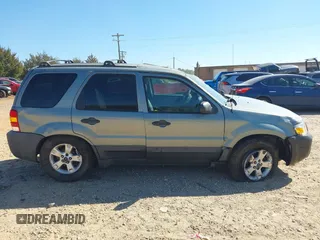 2007 Ford Escape XLT with VIN 1FMCU03137KB28362, listed as a IAAI auction lot 41689766 with 154,345 mi miles and . Bid and sale history available at DreamBid. Image 13.