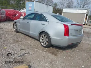 2014 Cadillac ATS Luxury RWD z VIN 1G6AB5RX4E0113469, wystawiony jako IAAI lot #41673813 z przebiegiem 102 537 mil mil oraz . Historia ofert i sprzedaży dostępna na DreamBid. Obrazek 3.