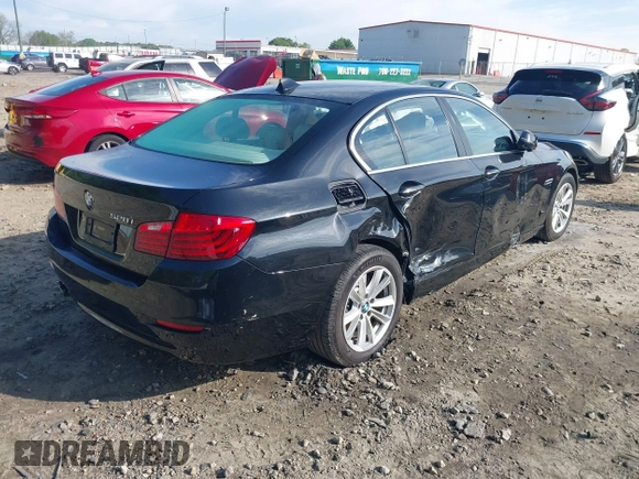 2015 BMW 5 Series 528i with VIN WBA5A5C56FD519138, listed as a IAAI auction lot 41989497 with 214,326 mi miles and . Bid and sale history available at DreamBid. Image 4.