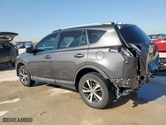 2016 Toyota RAV4 XLE with VIN 2T3WFREV2GW292774, listed as a Copart auction lot 52349865 with 96,896 mi miles and Salvage Title. Bid and sale history available at carsss.com. Image 2.
