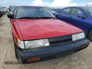 1987 Nissan Sentra z VIN JN1PB2411HU026525, wystawiony jako Copart lot #78997744 z przebiegiem 65 716 mil mil oraz Nie do naprawy. Historia ofert i sprzedaży dostępna na DreamBid. Obrazek 5.