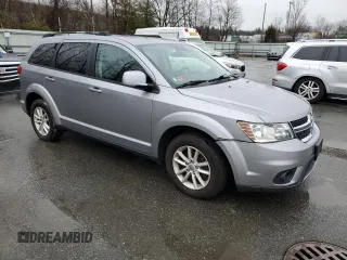 2017 Dodge Journey SXT z VIN 3C4PDDBG5HT578436, wystawiony jako Copart lot #52572175 z przebiegiem 70 111 mil mil oraz Czysty tytuł • Clean title. Historia ofert i sprzedaży dostępna na DreamBid. Obrazek 4.