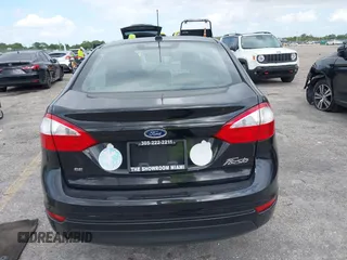 2015 Ford Fiesta SE with VIN 3FADP4BJ5FM130099, listed as a IAAI auction lot 42126960 with 82,299 mi miles and . Bid and sale history available at DreamBid. Image 16.