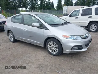 2013 Honda Insight EX z VIN JHMZE2H72DS003738, wystawiony jako IAAI lot #42544859 z przebiegiem 94 474 mil mil oraz . Historia ofert i sprzedaży dostępna na DreamBid. Obrazek 1.