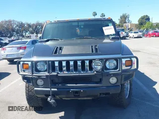 2003 Hummer H2 z VIN 5GRGN23U63H117676, wystawiony jako IAAI lot #41816411 z przebiegiem Nie podano mil oraz . Historia ofert i sprzedaży dostępna na DreamBid. Obrazek 12.