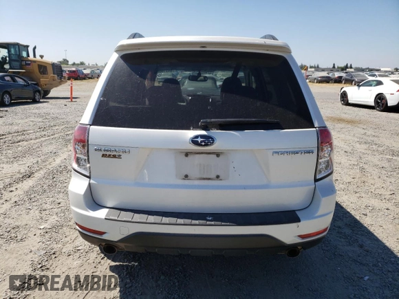 2009 Subaru Forester X with VIN JF2SH63679H777246, listed as a Copart auction lot 64516665 with 183,400 mi miles and Salvage title. Bid and sale history available at DreamBid. Image 6.