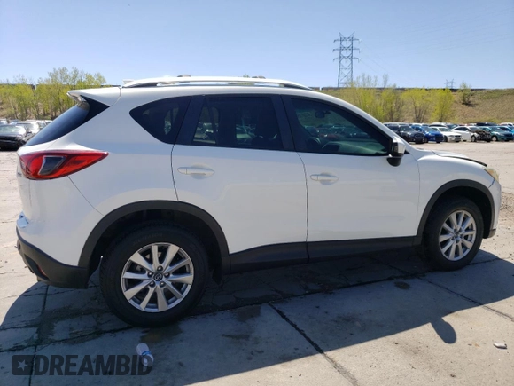 2014 Mazda CX-5 Touring z VIN JM3KE4CYXE0393443, wystawiony jako Copart lot #54738705 z przebiegiem 68 220 mil mil oraz Szkody całkowita. Historia ofert i sprzedaży dostępna na DreamBid. Obrazek 3.