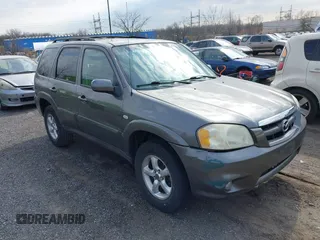 2005 Mazda Tribute S with VIN 4F2CZ96195KM38664, listed as a IAAI auction lot 41731666 with 117,956 mi miles and . Bid and sale history available at carsss.com. Image 1.