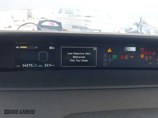 2019 Toyota Prius L Eco with VIN JTDKARFU8K3102331, listed as a IAAI auction lot 41852084 with 54,275 mi miles. Bid and sale history available at carsss.com. Image 7.