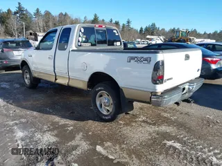2000 Ford F-150 XL with VIN 1FTRX18W9YNB14241, listed as a IAAI auction lot 41494972 with Not provided miles and . Bid and sale history available at DreamBid. Image 3.