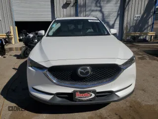 2019 Mazda CX-5 Grand Touring with VIN JM3KFADM4K1674408, listed as a Copart auction lot 47684015 with 77,554 mi miles and Salvage Title. Bid and sale history available at carsss.com. Image 5.