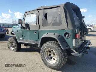 2001 Jeep Wrangler SE with VIN 1J4FA29P71P329199, listed as a Copart auction lot 48144035 with 114,904 mi miles and Salvage Title. Bid and sale history available at carsss.com. Image 2.
