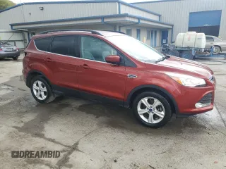 2015 Ford Escape SE with VIN 1FMCU9GX2FUB47068, listed as a Copart auction lot 54772975 with 97,348 mi miles and Salvage Title. Bid and sale history available at DreamBid. Image 4.