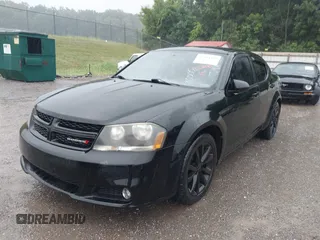 2013 Dodge Avenger SXT with VIN 1C3CDZCB5DN716005, listed as a IAAI auction lot 42644469 with 205,527 mi miles and . Bid and sale history available at DreamBid. Image 2.