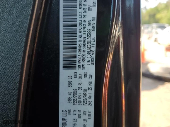 2013 Jeep Wrangler Unlimited Sahara with VIN 1C4HJWEG5DL585896, listed as a Copart auction lot 52007635 with 101,465 mi miles and Salvage Title. Bid and sale history available at carsss.com. Image 14.