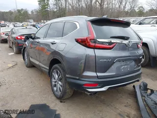 2021 Honda CR-V Touring with VIN 2HKRW2H93MH675015, listed as a IAAI auction lot 41711953 with 58,287 mi miles. Bid and sale history available at carsss.com. Image 4.