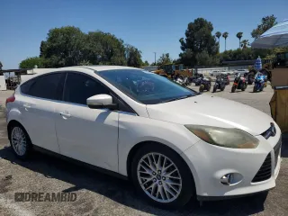 2014 Ford Focus Titanium with VIN 1FADP3N21EL264509, listed as a Copart auction lot 59544475 with 154,142 mi miles and Clean title. Bid and sale history available at DreamBid. Image 4.