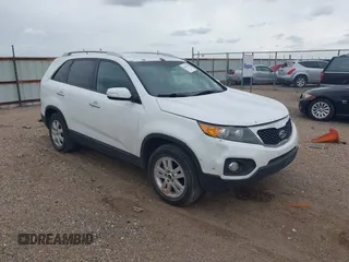 2013 Kia Sorento LX with VIN 5XYKT3A65DG313663, listed as a IAAI auction lot 42613227 with 127,335 mi miles and . Bid and sale history available at DreamBid. Image 1.