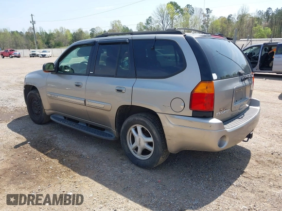 2002 GMC Envoy SLT with VIN 1GKDS13S422446808, listed as a IAAI auction lot 41896943 with 271,771 mi miles. Bid and sale history available at carsss.com. Image 3.