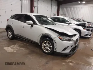 2016 Mazda CX-3 Sport with VIN JM1DKFB72G0135676, listed as a IAAI auction lot 41530318 with 144,588 mi miles. Bid and sale history available at carsss.com. Image 1.