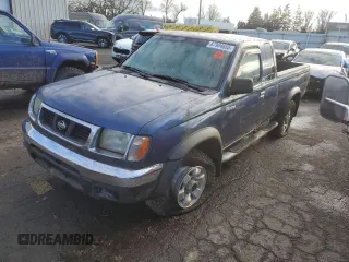 2000 Nissan Frontier XE z VIN 1N6ED26Y6YC344457, wystawiony jako Copart lot #87904655 z przebiegiem 141 941 mil mil oraz Czysty tytuł • Clean title. Historia ofert i sprzedaży dostępna na DreamBid. Obrazek 1.