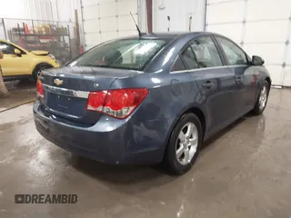 2014 Chevrolet Cruze 1LT z VIN 1G1PC5SB4E7175022, wystawiony jako IAAI lot #41563090 z przebiegiem 109 754 mil mil oraz . Historia ofert i sprzedaży dostępna na DreamBid. Obrazek 4.