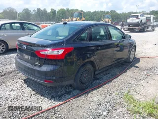 2012 Ford Focus SE with VIN 1FAHP3F21CL390012, listed as a IAAI auction lot 42634521 with 214,617 mi miles and . Bid and sale history available at DreamBid. Image 4.