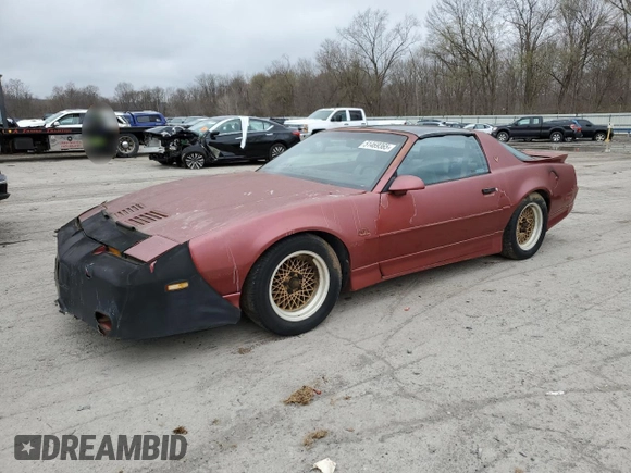 1989 Pontiac Firebird z VIN 1G2FW2181KL244335, wystawiony jako Copart lot #51469365 z przebiegiem 150 615 mil mil oraz Czysty tytuł • Clean title. Historia ofert i sprzedaży dostępna na DreamBid. Obrazek 1.