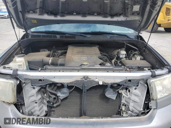 2013 Toyota Tundra z VIN 5TFUM5F17DX041659, wystawiony jako Copart lot #47637415 z przebiegiem 133 846 mil mil oraz Szkoda całkowita • Salvage title. Historia ofert i sprzedaży dostępna na DreamBid. Obrazek 11.