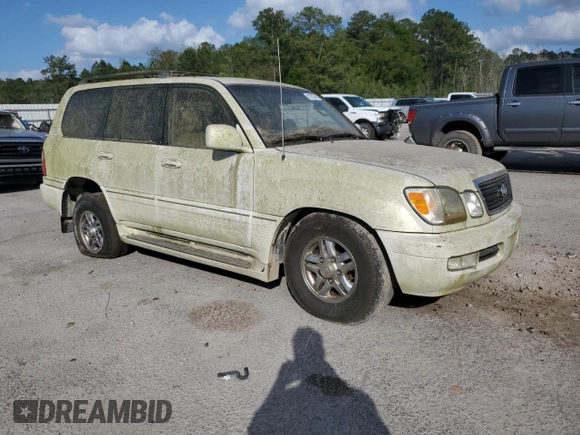 2002 Lexus LX 470 z VIN JTJHT00W623517039, wystawiony jako Copart lot #51458785 z przebiegiem 219 906 mil mil oraz Tytuł czysty. Historia ofert i sprzedaży dostępna na DreamBid. Obrazek 4.