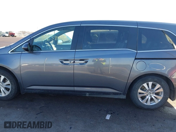 2014 Honda Odyssey EX-L with VIN 5FNRL5H61EB079739, listed as a IAAI auction lot 41659048 with 137,012 mi miles and . Bid and sale history available at carsss.com. Image 14.