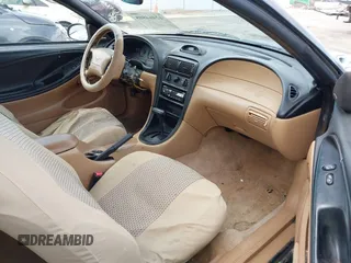 1996 Ford Mustang GT z VIN 1FALP42XXTF137304, wystawiony jako IAAI lot #42464808 z przebiegiem 166 565 mil mil oraz . Historia ofert i sprzedaży dostępna na DreamBid. Obrazek 5.