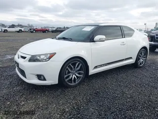 2013 Scion tC with VIN JTKJF5C70D3065601, listed as a IAAI auction lot 41272881 with 110,828 mi miles. Bid and sale history available at carsss.com. Image 2.