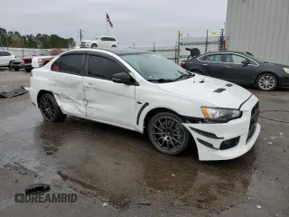2015 Mitsubishi Lancer Evolution Final Edition with VIN JA32W7FV8FU028938, listed as a Copart auction lot 44698405 with 48,801 mi miles and Salvage Title. Bid and sale history available at carsss.com. Image 4.