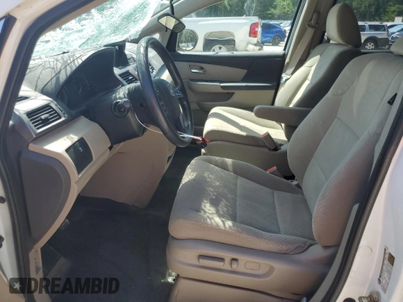 2015 Honda Odyssey LX with VIN 5FNRL5H27FB054746, listed as a Copart auction lot 53023405 with 96,548 mi miles and Salvage Title. Bid and sale history available at DreamBid. Image 7.