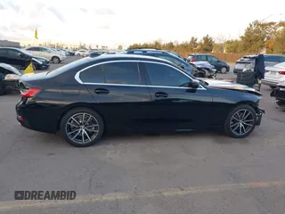 2021 BMW 3 Series 330i with VIN 3MW5R1J07M8B47179, listed as a IAAI auction lot 41450153 with 66,689 mi miles. Bid and sale history available at carsss.com. Image 14.