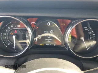 2021 Jeep Wrangler Unlimited Sahara z VIN 1C4JJXP63MW720948, wystawiony jako Copart lot #57115825 z przebiegiem 33 391 mil mil oraz Szkoda całkowita • Salvage title. Historia ofert i sprzedaży dostępna na DreamBid. Obrazek 9.