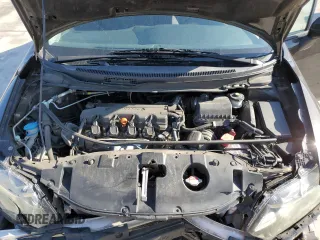 2014 Honda Civic LX z VIN 2HGFB2F54EH533010, wystawiony jako Copart lot #52859605 z przebiegiem 81 051 mil mil oraz Szkoda całkowita • Salvage title. Historia ofert i sprzedaży dostępna na DreamBid. Obrazek 12.