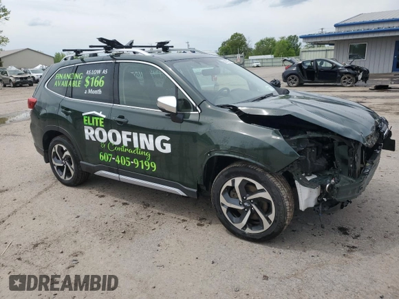 2024 Subaru Forester Touring with VIN JF2SKAMC8RH432381, listed as a Copart auction lot 56957295 with 62,132 mi miles and Salvage title. Bid and sale history available at DreamBid. Image 4.