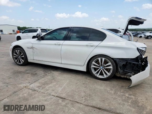 2016 BMW 5 Series 528i with VIN WBA5A5C59GD528109, listed as a Copart auction lot 61691405 with 107,837 mi miles and Salvage title. Bid and sale history available at DreamBid. Image 2.