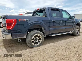 2021 Ford F-150 XL with VIN 1FTFW1E80MFA32611, listed as a Copart auction lot 61899255 with 98,278 mi miles and Salvage title. Bid and sale history available at DreamBid. Image 3.