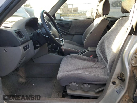 1999 Subaru Forester L with VIN JF1SF6355XG739180, listed as a Copart auction lot 84467674 with 127,591 mi miles and Salvage Title. Bid and sale history available at carsss.com. Image 7.