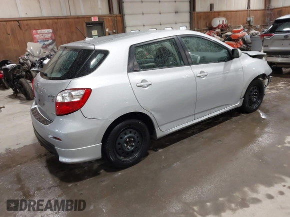 2009 Toyota Matrix S with VIN 2T1LE40E59C006994, listed as a IAAI auction lot 42232273 with 129,555 mi miles and . Bid and sale history available at DreamBid. Image 4.