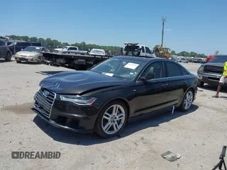 2016 Audi A6 Premium Plus with VIN WAUGFAFC0GN166596, listed as a IAAI auction lot 42526292 with 106,584 mi miles and . Bid and sale history available at DreamBid. Image 17.