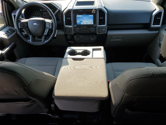 2016 Ford F-150 XLT with VIN 1FTEW1EF7GFB22403, listed as a Copart auction lot 60332815 with 126,139 mi miles and Salvage title. Bid and sale history available at DreamBid. Image 8.